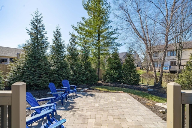 view of patio / terrace featuring fence