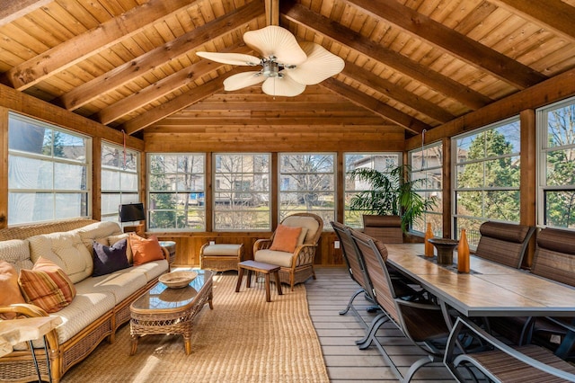 sunroom with wood ceiling, vaulted ceiling with beams, and a ceiling fan