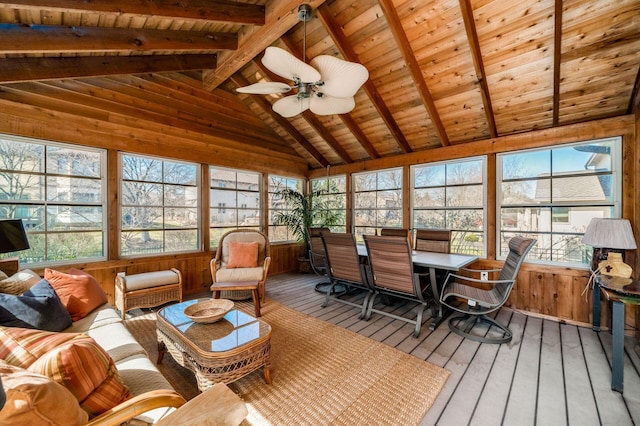 sunroom / solarium featuring wood ceiling, lofted ceiling with beams, and a ceiling fan