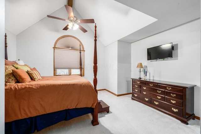 bedroom with vaulted ceiling, a ceiling fan, baseboards, and light carpet