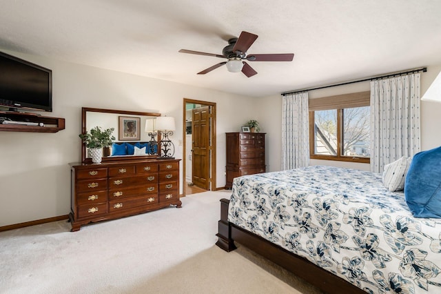 bedroom featuring baseboards, carpet, and ceiling fan