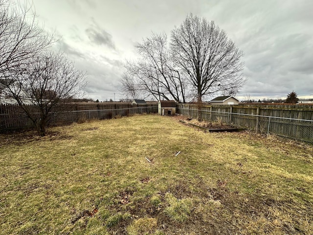 view of yard featuring a fenced backyard