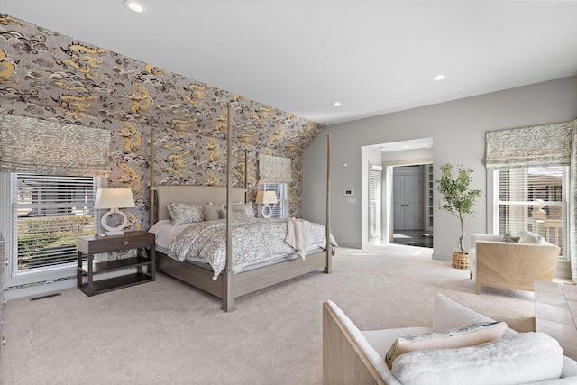 bedroom with recessed lighting, light colored carpet, and visible vents