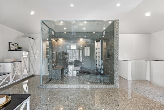 bathroom with granite finish floor, recessed lighting, and baseboards