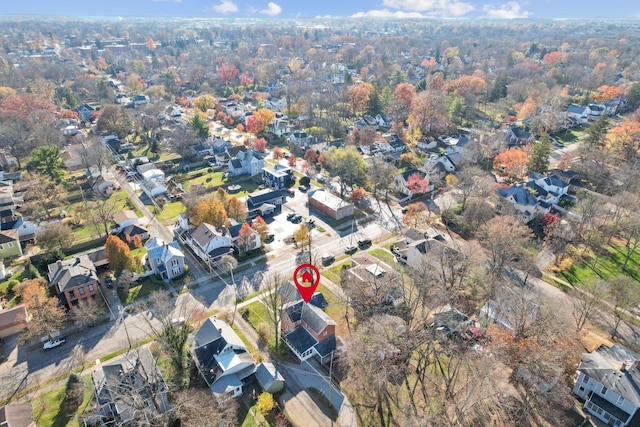 birds eye view of property with a residential view