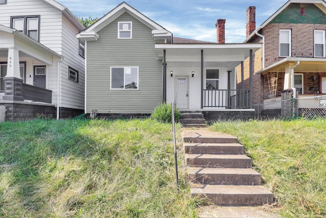 view of front of property featuring covered porch