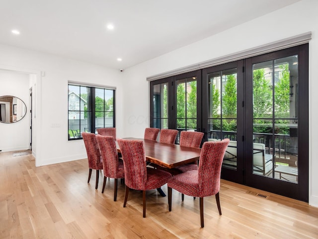 597 S 9th St, Columbus, OH 43206 - dining room with french doors, light wood-type flooring, recessed lighting, and baseboards
