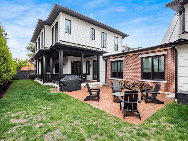 597 S 9th St, Columbus, OH 43206 - rear view of house with a patio area and a standing seam roof