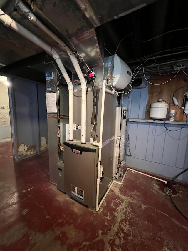 utility room with water heater