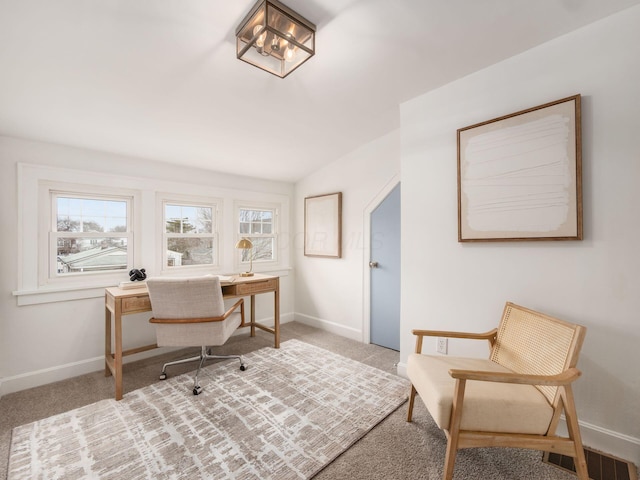 carpeted home office with visible vents and baseboards