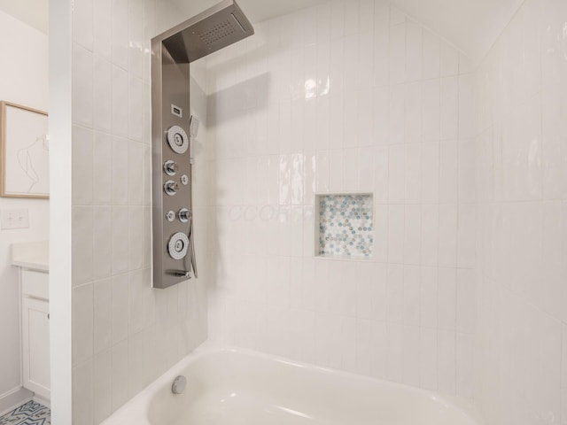 bathroom with lofted ceiling and shower / washtub combination