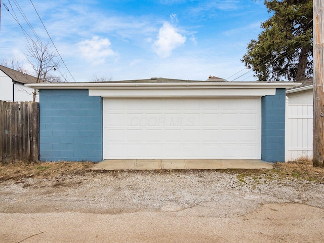 detached garage with fence