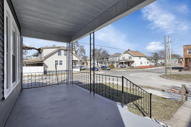 balcony with a porch and a residential view