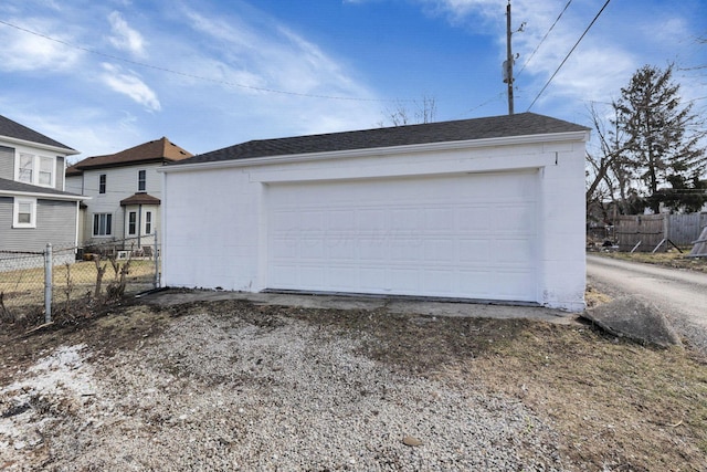 detached garage with fence