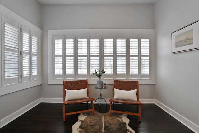 sitting room featuring wood finished floors and baseboards