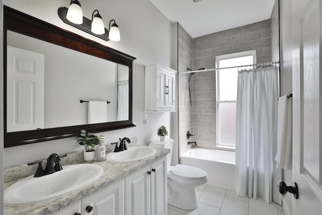 full bath featuring toilet, double vanity, a sink, and shower / tub combo with curtain