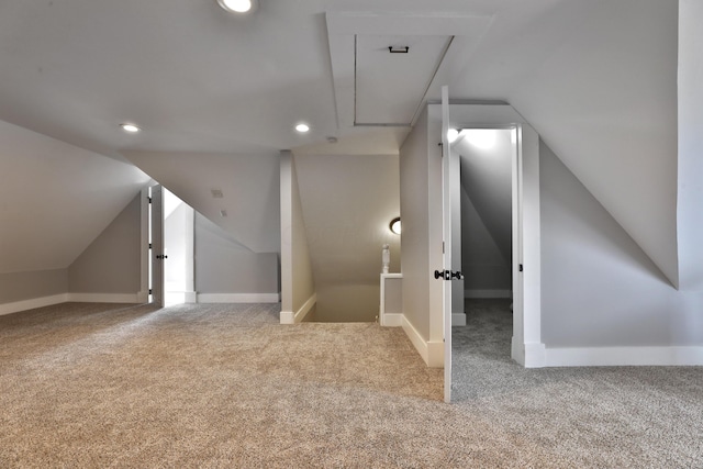 additional living space featuring lofted ceiling, carpet floors, recessed lighting, and baseboards