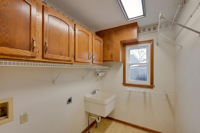 laundry area with washer hookup, light floors, cabinet space, hookup for an electric dryer, and baseboards