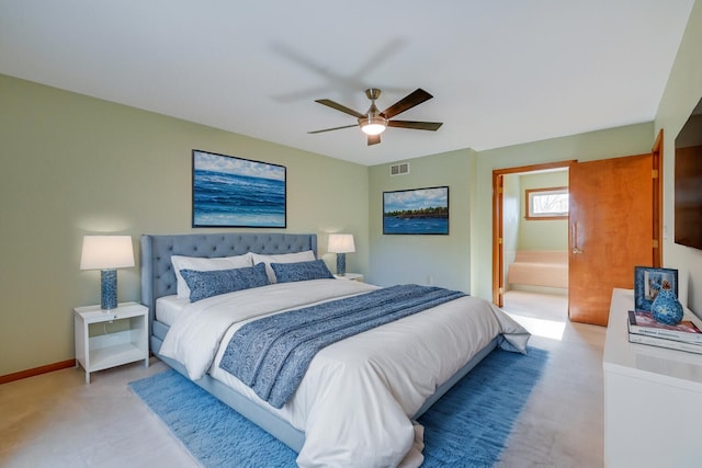 bedroom with ceiling fan, ensuite bath, visible vents, and baseboards