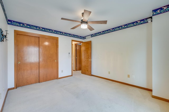 unfurnished bedroom with light carpet, ceiling fan, visible vents, and baseboards