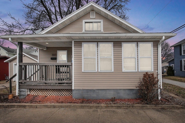 bungalow-style home with a porch