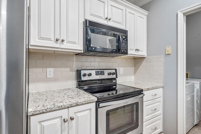 kitchen with backsplash, appliances with stainless steel finishes, white cabinetry, light stone countertops, and independent washer and dryer