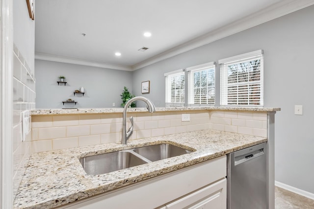 kitchen with tasteful backsplash, ornamental molding, a sink, light stone countertops, and dishwasher