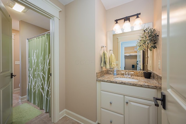 bathroom featuring a shower with curtain, visible vents, vanity, and baseboards