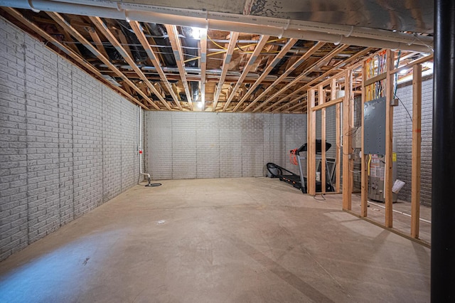 unfinished basement with brick wall