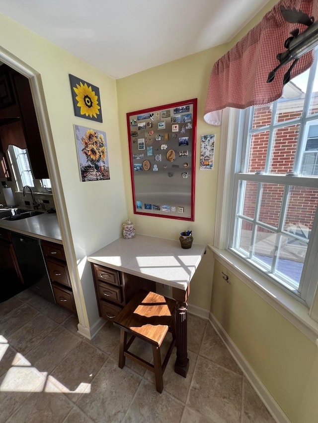 dining room featuring baseboards