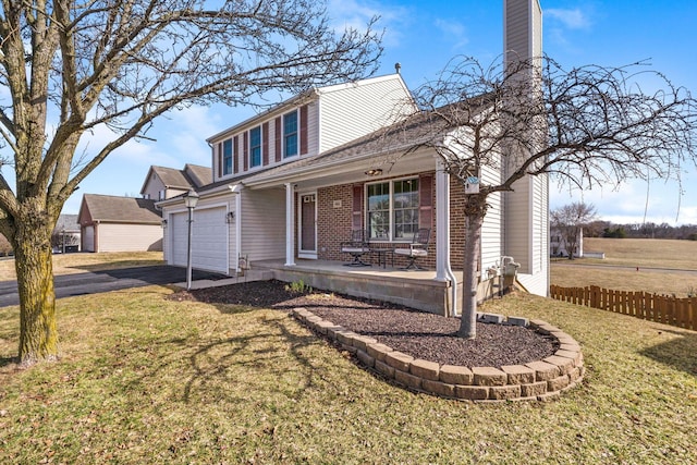 traditional-style home with aphalt driveway, brick siding, a porch, a front yard, and fence