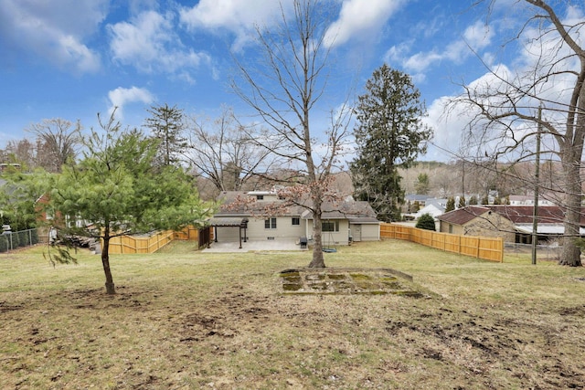 view of yard featuring a fenced backyard and a patio