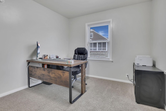 carpeted office with baseboards