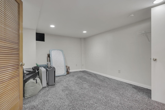 interior space with carpet, baseboards, and recessed lighting