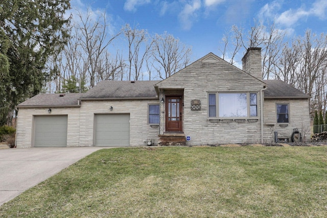 view of front facade with a garage, a chimney, a front lawn, and concrete driveway