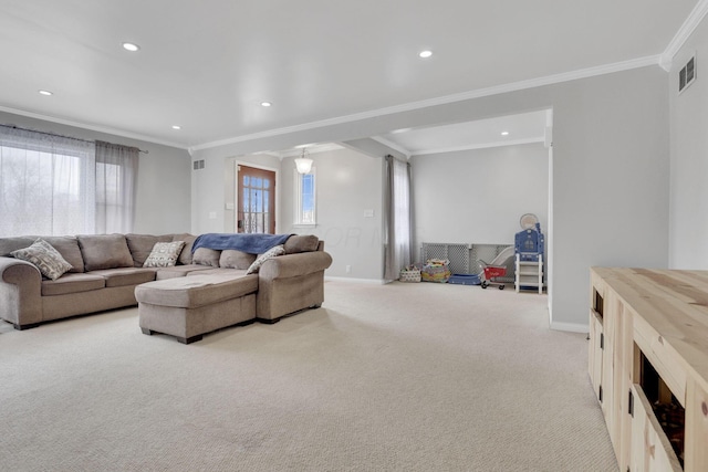 carpeted living room featuring ornamental molding, recessed lighting, visible vents, and baseboards