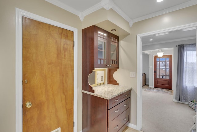 hallway featuring ornamental molding, recessed lighting, and light carpet