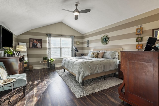 bedroom featuring vaulted ceiling, ceiling fan, wood finished floors, and baseboards