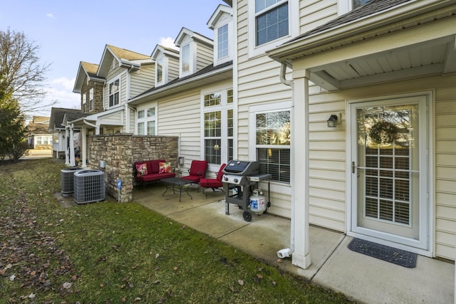 exterior space featuring a grill and cooling unit