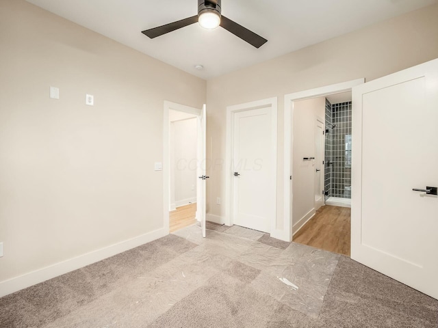 1093 Franklin Ave, Columbus, OH 43205 - unfurnished bedroom featuring baseboards, a ceiling fan, and light colored carpet