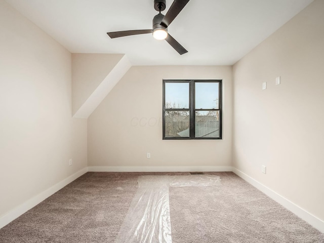 1093 Franklin Ave, Columbus, OH 43205 - additional living space with vaulted ceiling, carpet, a ceiling fan, and baseboards