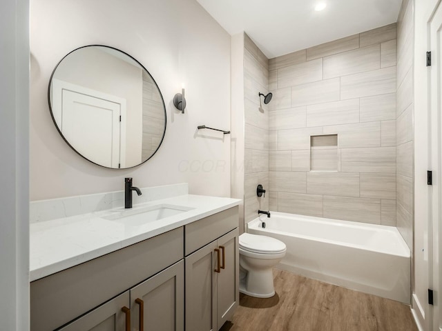 1093 Franklin Ave, Columbus, OH 43205 - bathroom featuring toilet, shower / tub combination, wood finished floors, and vanity