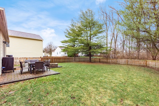 view of yard featuring a fenced backyard and a patio