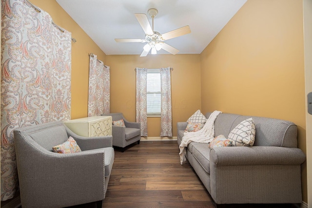 interior space with dark wood finished floors and a ceiling fan