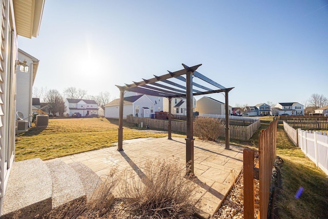 view of patio with a residential view, a fenced backyard, and a pergola