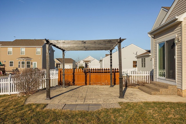 view of patio / terrace with a residential view, fence, entry steps, and a pergola