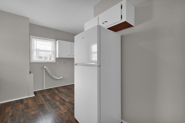 spacious closet with dark wood-type flooring