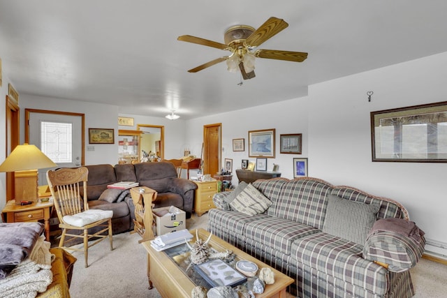 living room with light carpet and ceiling fan