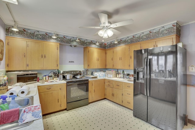 kitchen with ceiling fan, black appliances, light floors, and light countertops