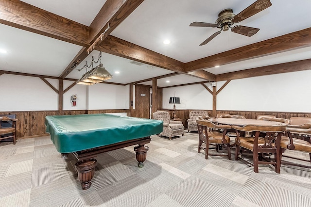 recreation room featuring pool table, beam ceiling, wainscoting, and light carpet